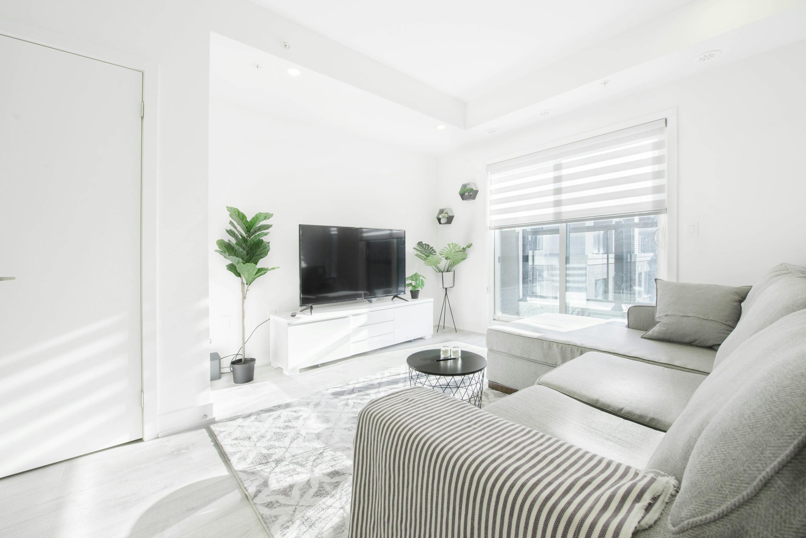 Bright and airy living room with modern minimalist decor and natural light.